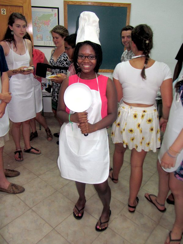 Cooking traditional Spanish food during cultural immersion